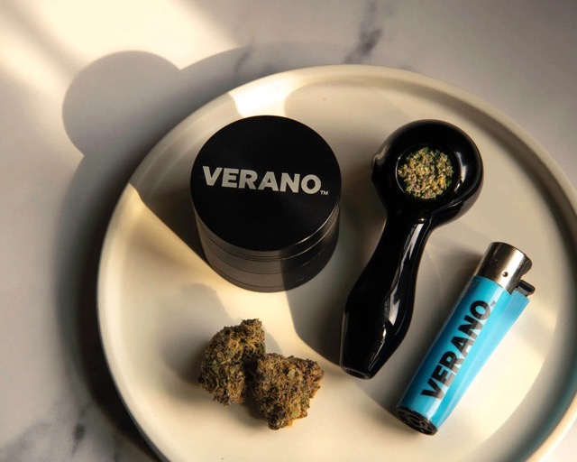 Verano cannabis essentials with grinder, lighter, flower, and glass pipe – top New Jersey cannabis brand offering premium flower, vapes, edibles, and wellness products.