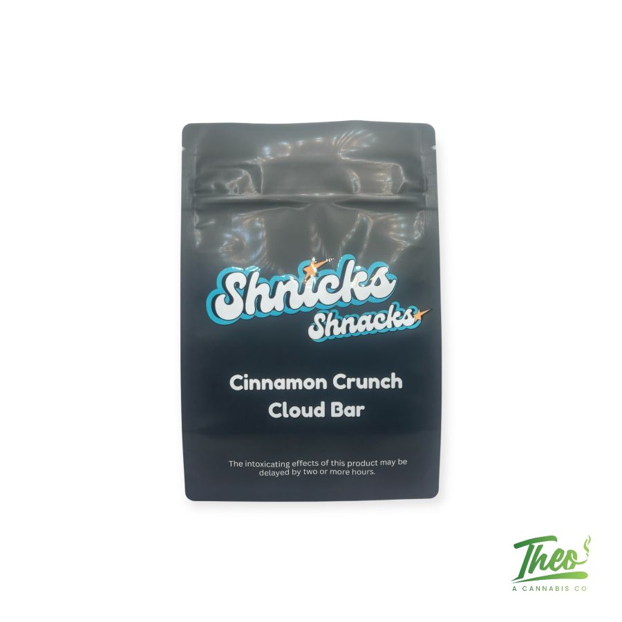 A product image of Shnick Shnack's Cinnamon Crunch Cloud Bar 10mg with Theo A Cannabis Dispensary logo on the bottom-right part of the white background.