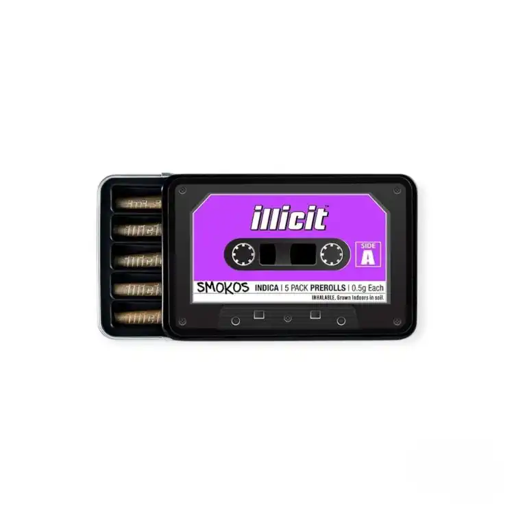 A retro cassette-style black tin with a vibrant purple label marked "Illicit" and "Side A," containing five 0.5g indica pre-rolls labeled "Smokos." Each joint is neatly packed and housed in an open sliding tray.
