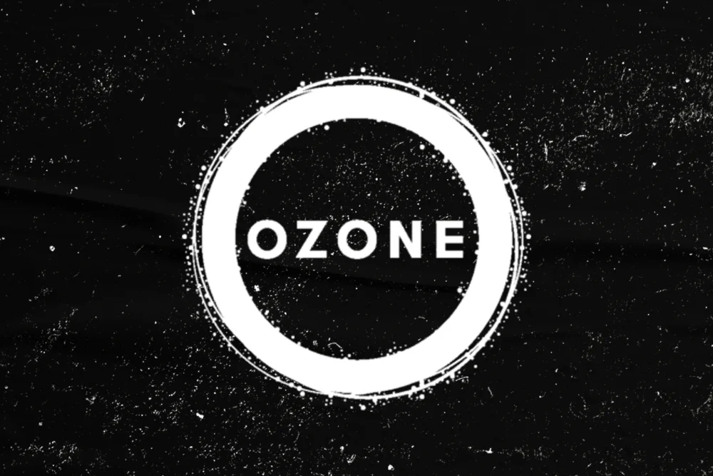 Ozone cannabis brand logo featuring a bold white circular emblem with the word ‘Ozone’ on a black textured background.