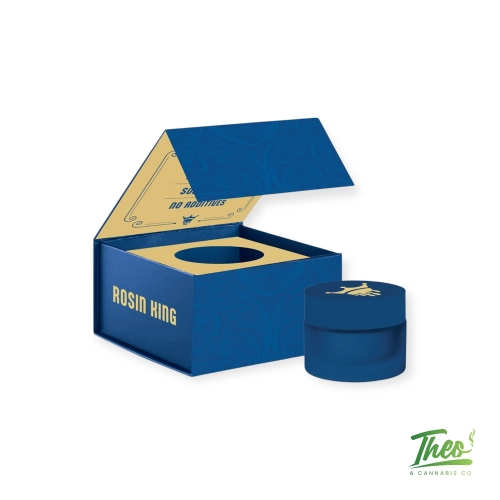 Rosin King cannabis concentrate packaging featuring blue and gold premium box with matching container, highlighting high-quality solventless rosin product on minimal white background.
