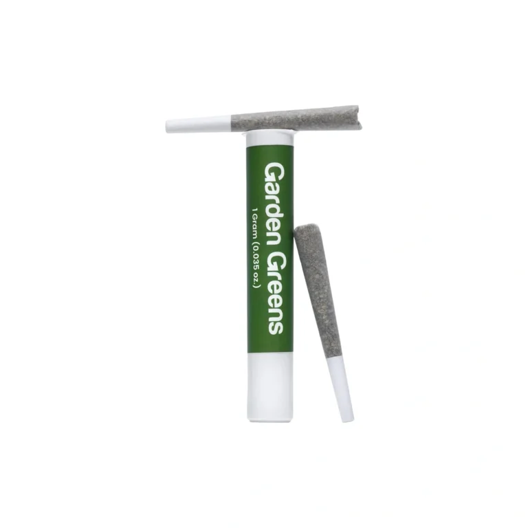 Flat lay of a green and white Garden Greens 1-gram pre-roll tube with two cannabis pre-rolls beside it, displayed on a clean white background with the Theo logo in the corner.